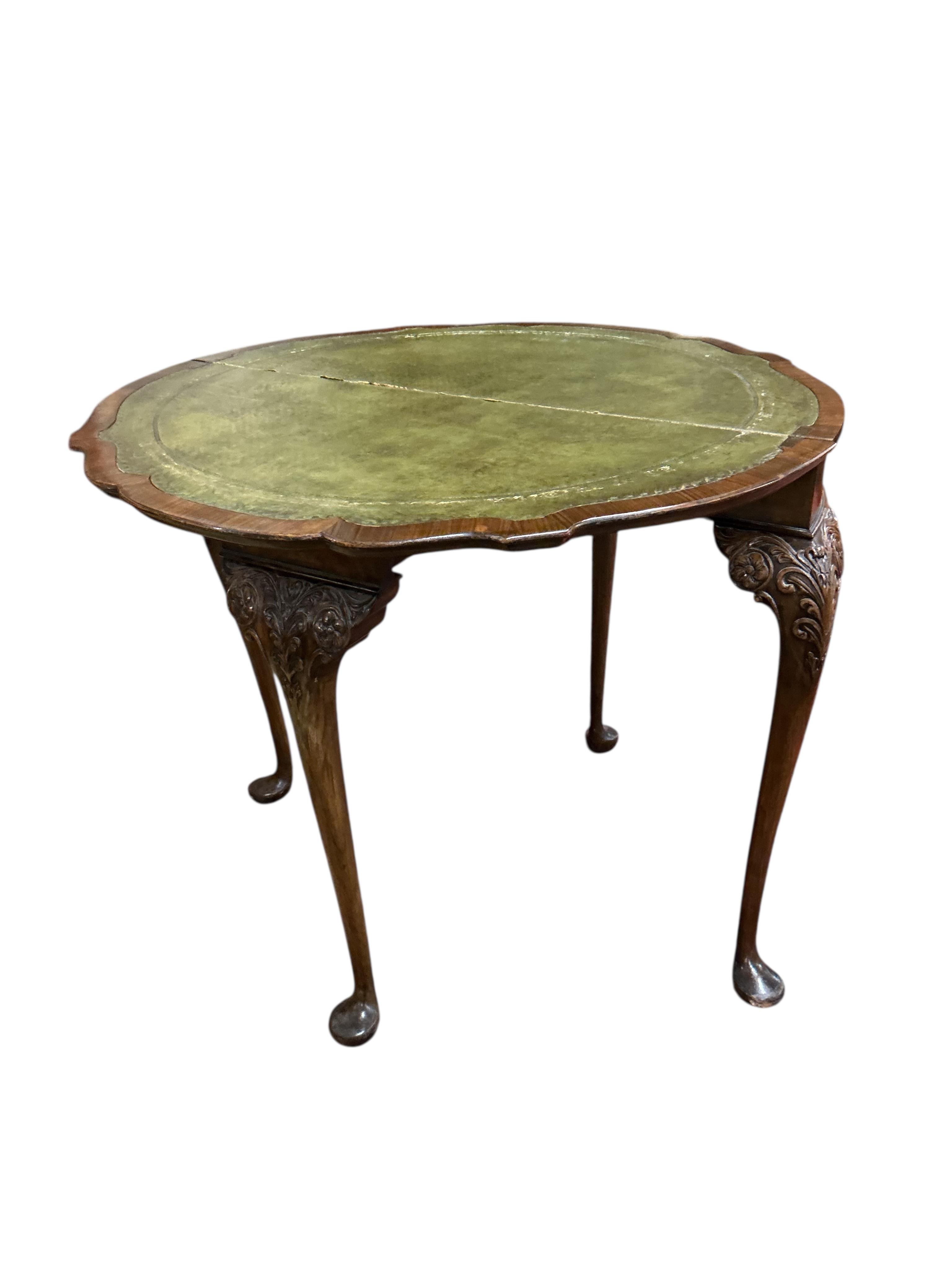 A Queen Anne Revival walnut folding card table, width 88cm, depth 44cm, height 74cm